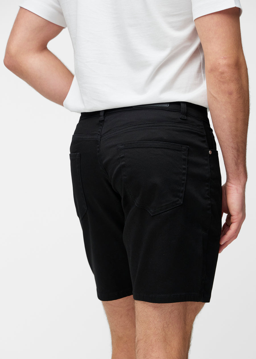 Sorte shorts til herre i fargen Ravens sett bakfra på nært hold for å vise passform og detaljer.