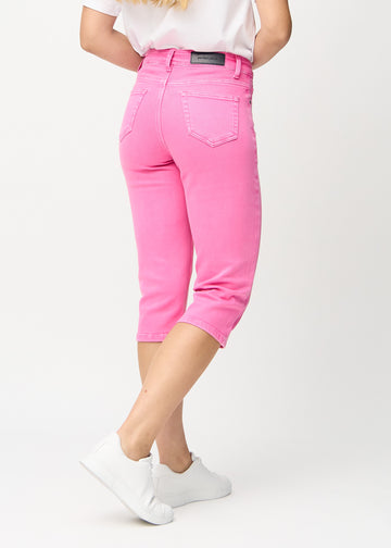 Lyserosa regular capris sett bakfra, slik at man kan se hele produktet.