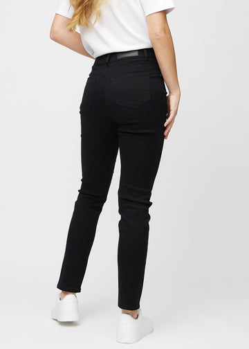 Svarte slim jeans sett bakfra, så man kan se hele produktet.