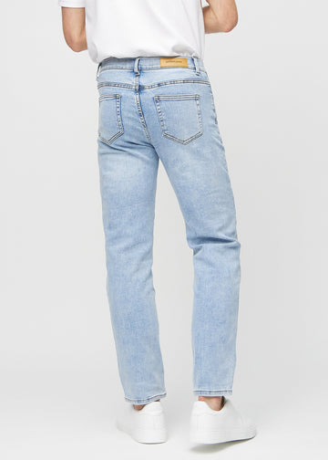 Lys denim regular jeans sett bakfra, slik at man kan se hele produktet.